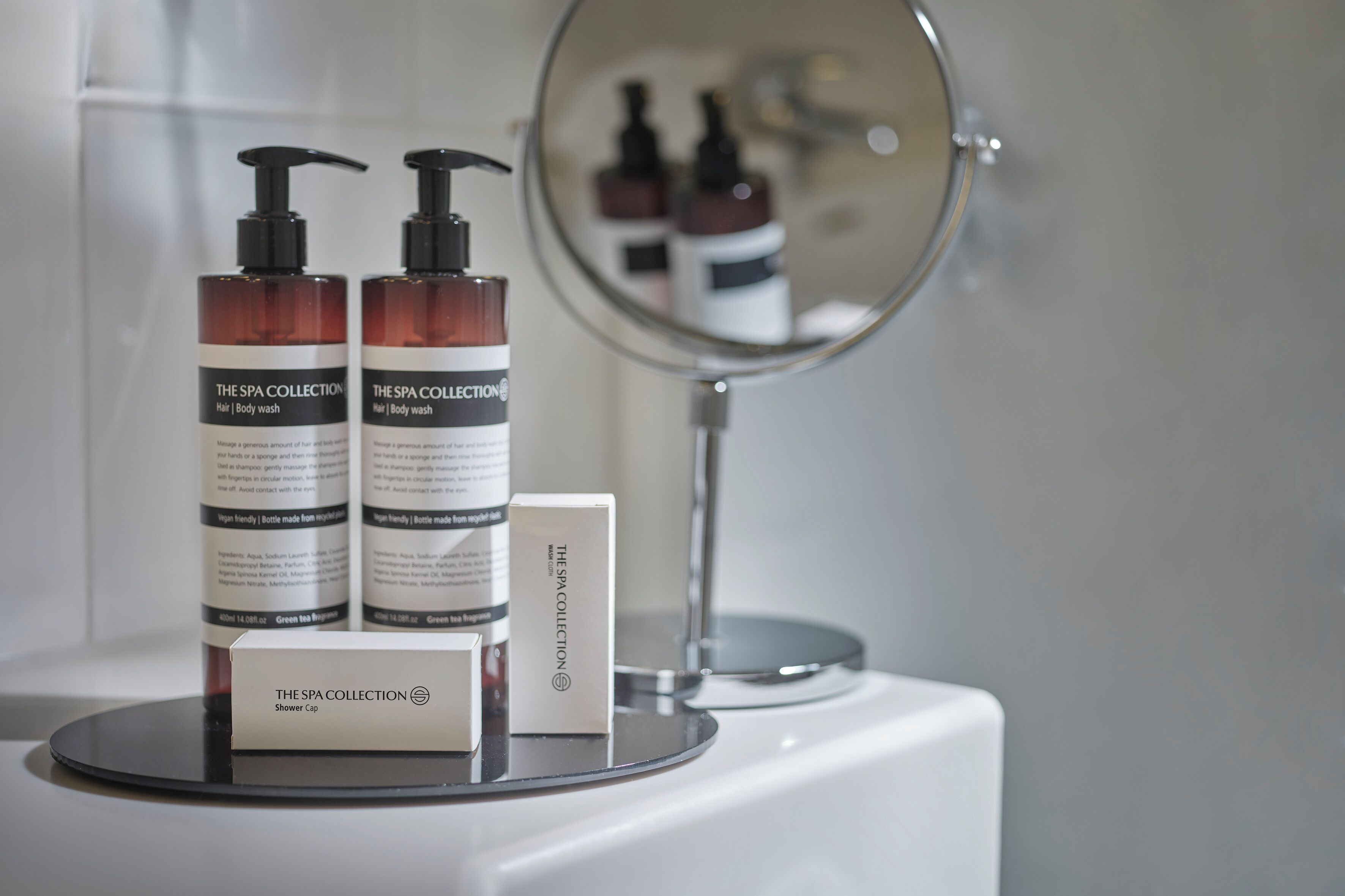 eco-friendly toiletries, hair dryer, towels