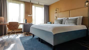 Premium bedding, down duvets, in-room safe, desk