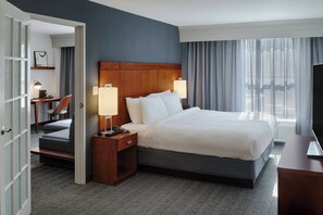 Premium bedding, pillow-top beds, desk, laptop workspace