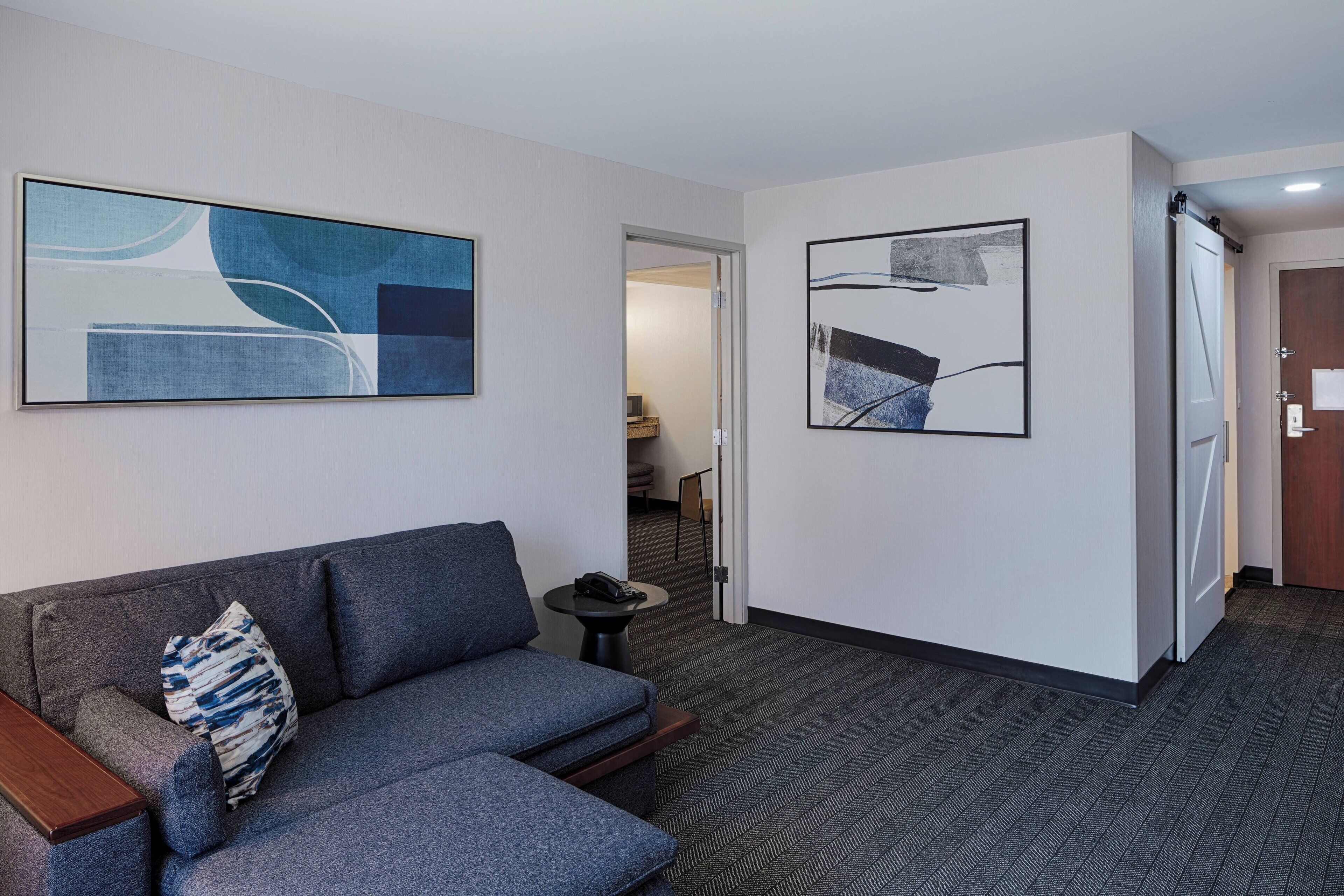 suite, 1 bedroom | living area | 50-inch flat-screen tv with cable channels, tv, netflix