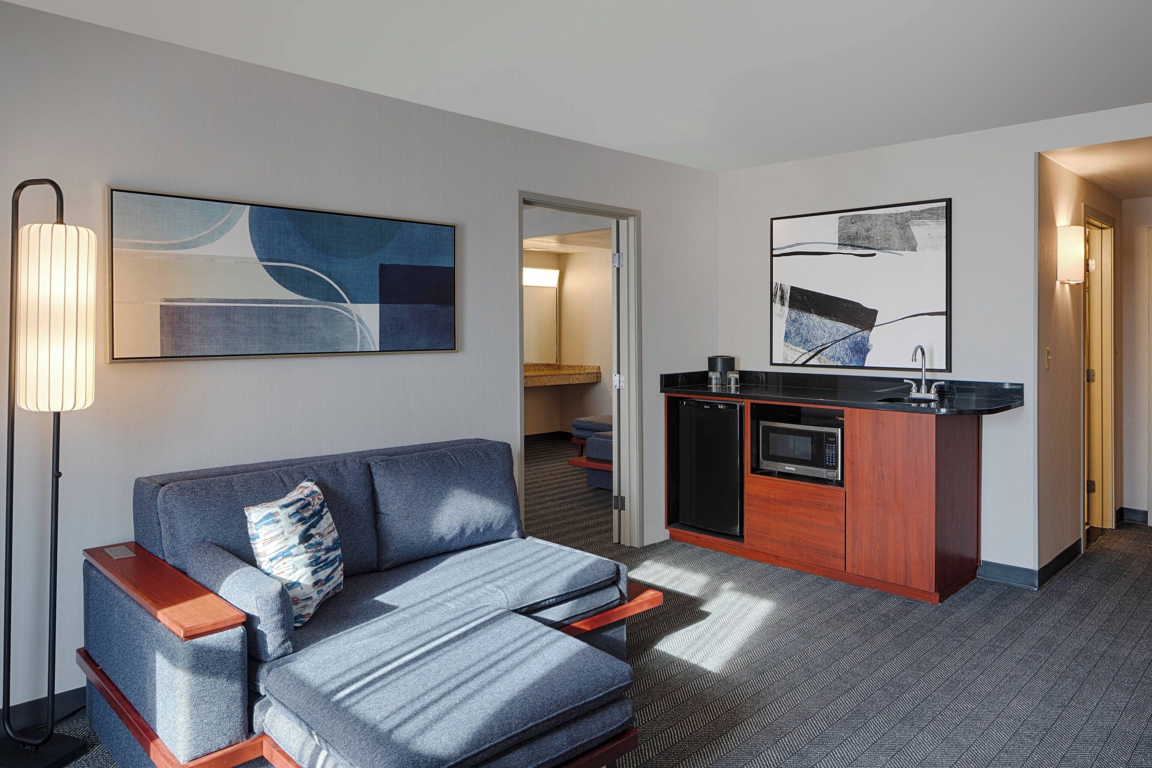 suite, 1 bedroom | living area | 50-inch flat-screen tv with cable channels, tv, netflix