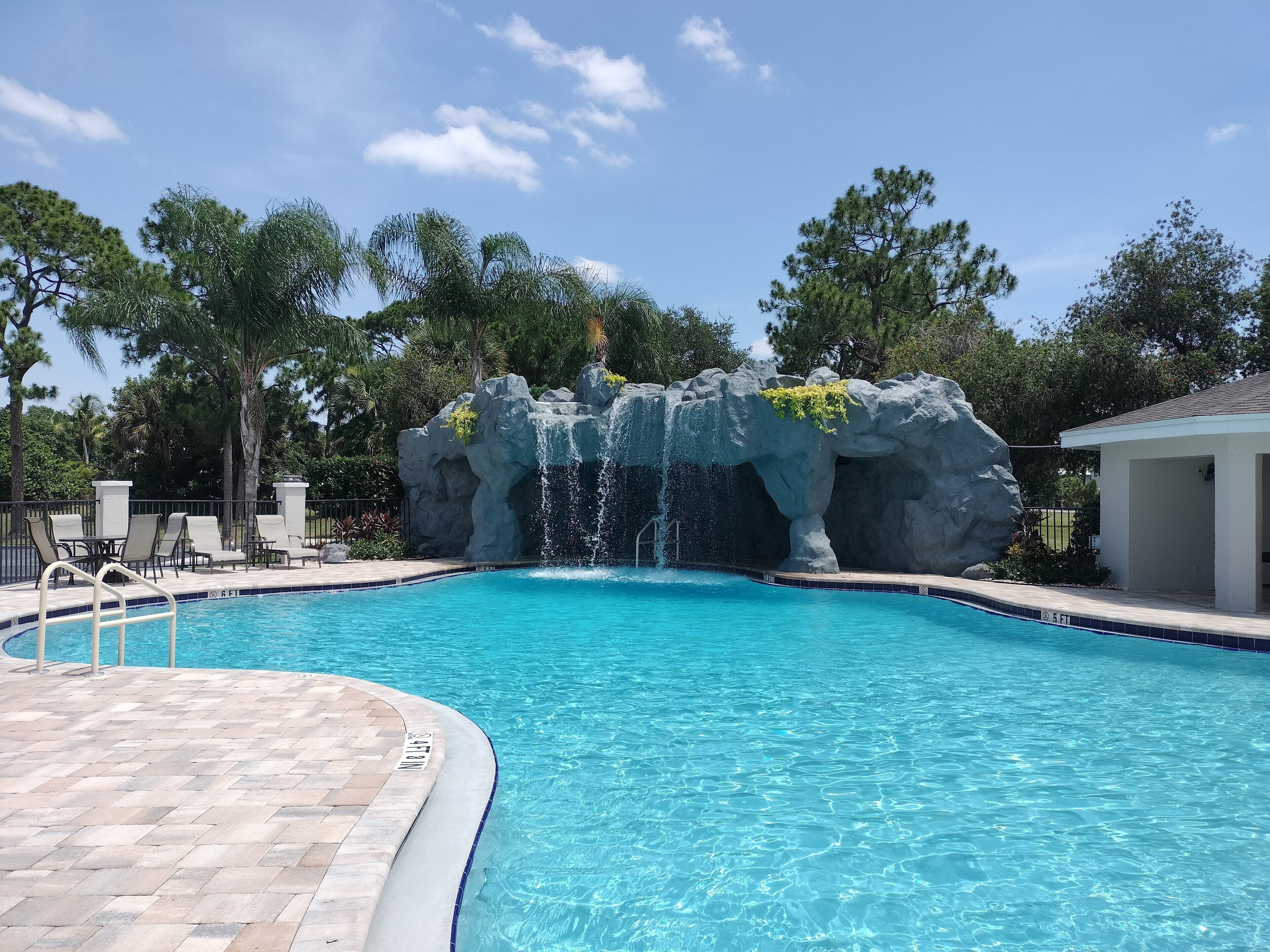 Outdoor pool, open 8:00 AM to 10:00 PM, pool umbrellas, pool loungers