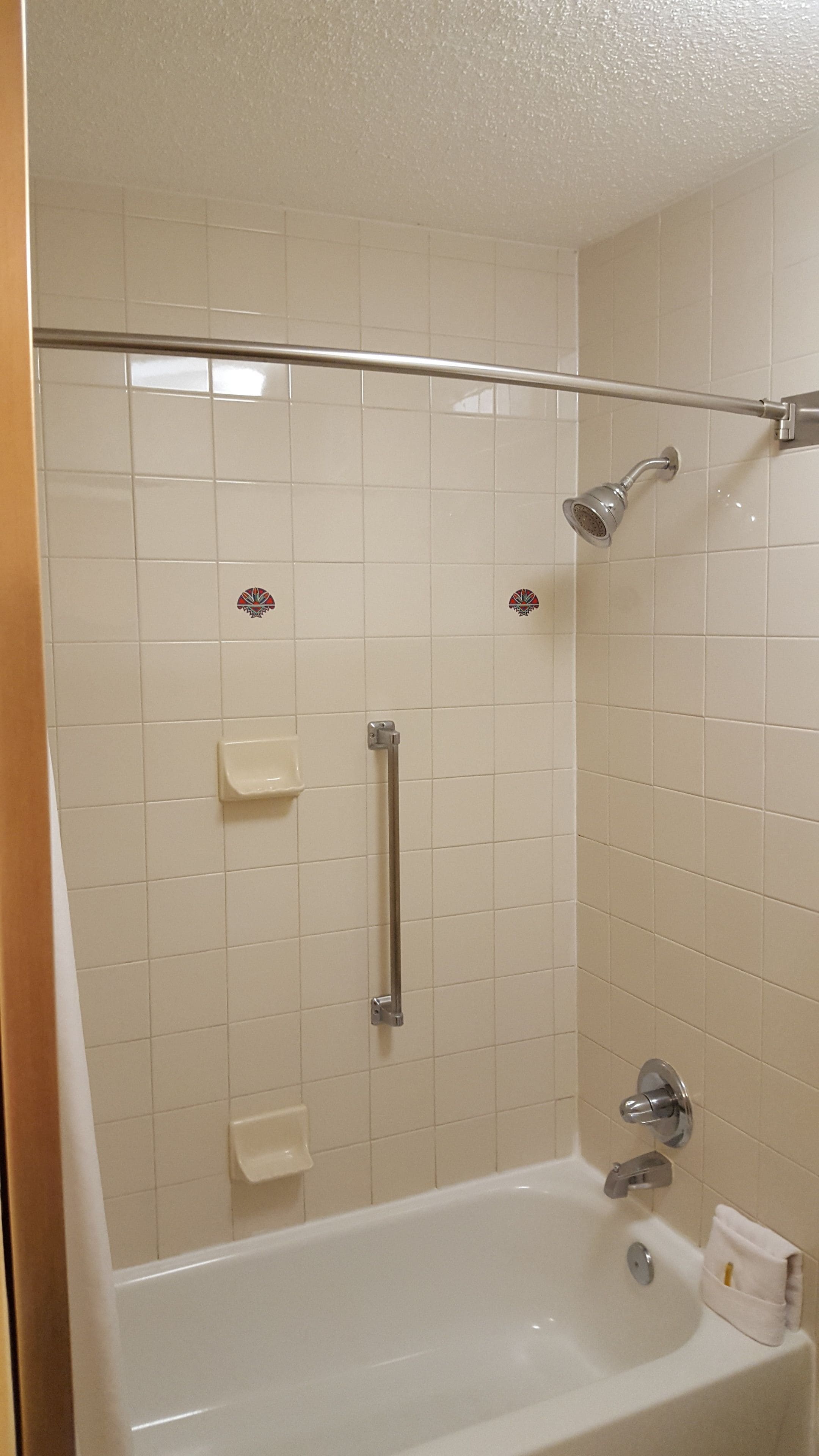 combined shower/bathtub, eco-friendly toiletries, hair dryer, towels