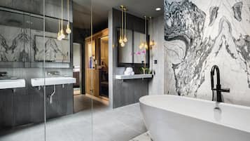 Shower, rainfall showerhead, designer toiletries, hair dryer