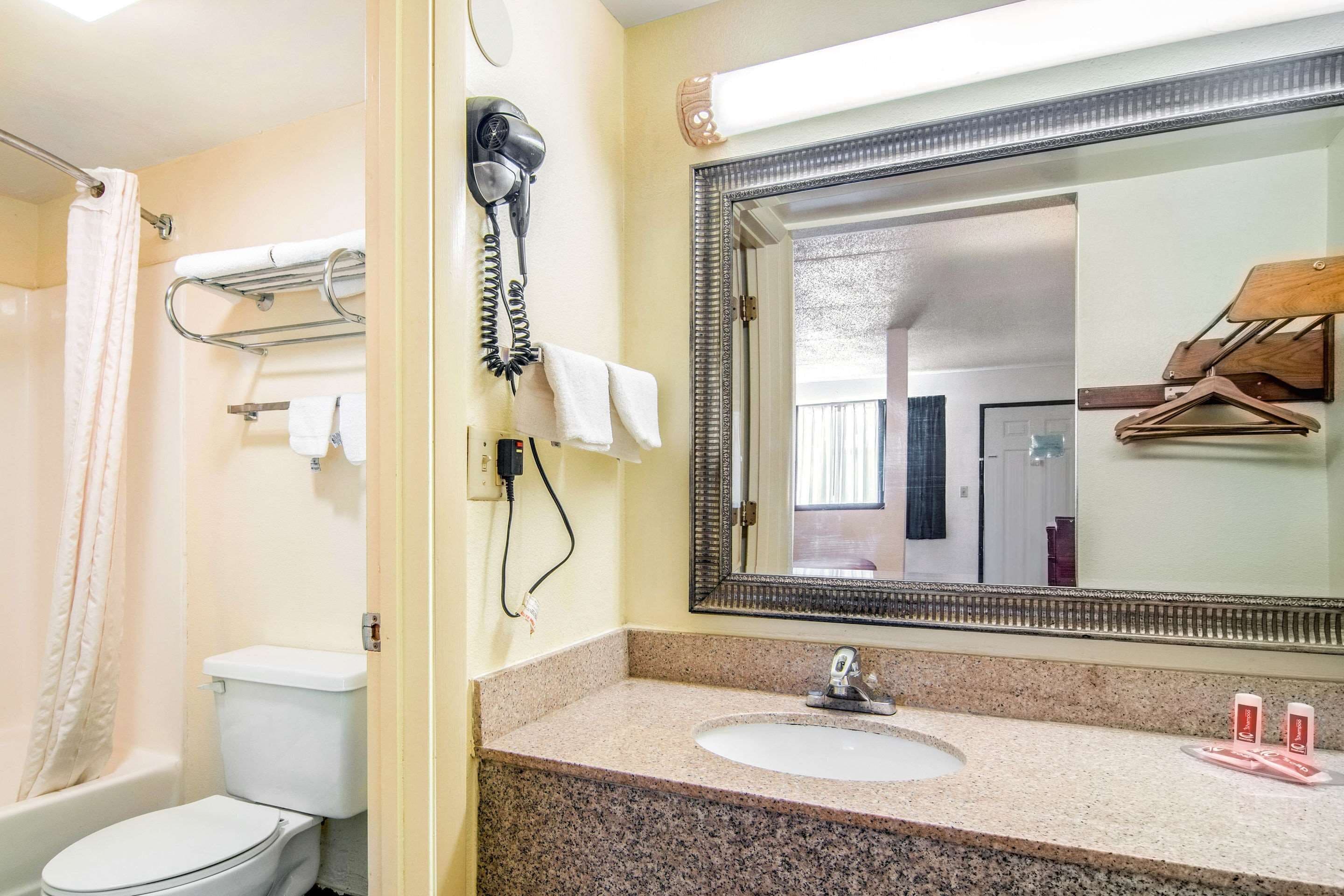 Eco-friendly toiletries, hair dryer, towels, soap