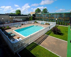 Seasonal outdoor pool, open 10 AM to 10 PM, pool loungers