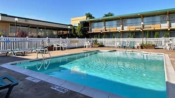 Seasonal outdoor pool, open 10 AM to 10 PM, pool loungers
