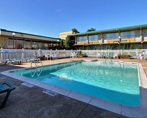 Seasonal outdoor pool, open 10 AM to 10 PM, pool loungers