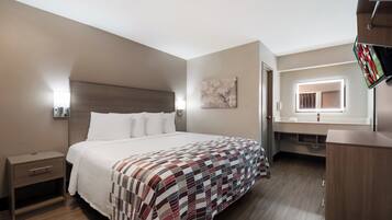 Standard Room, 1 King Bed, Non Smoking | Desk, blackout drapes, free WiFi, bed sheets