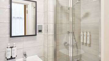 Shower, eco-friendly toiletries, towels