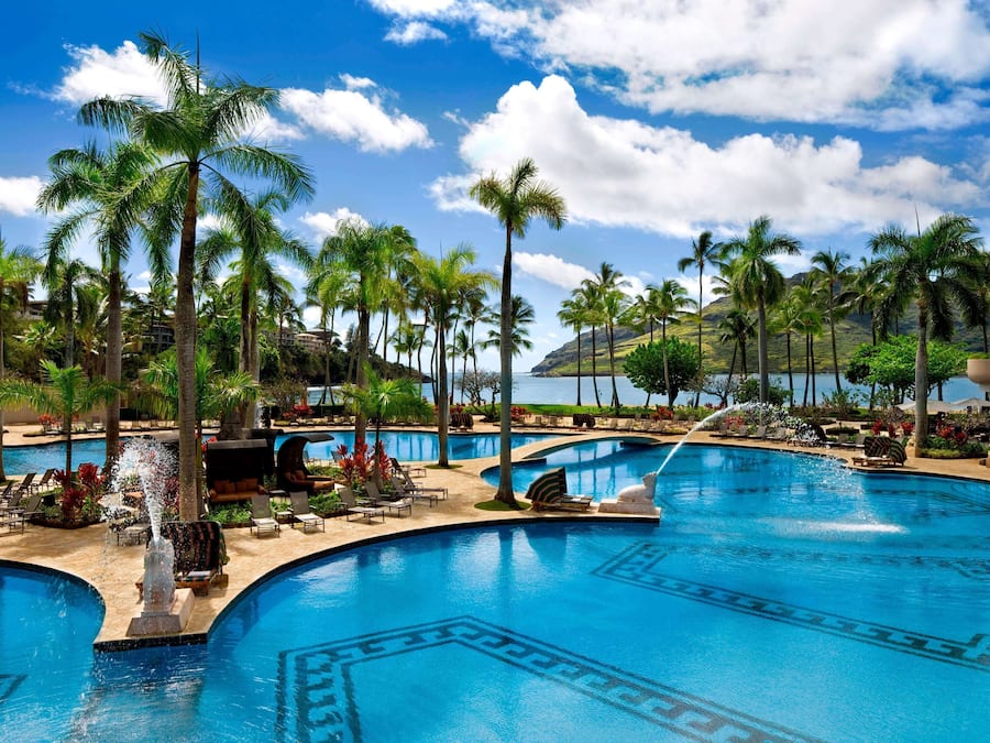 Outdoor pool, open 7:00 AM to 10:00 PM, pool cabanas (surcharge)
