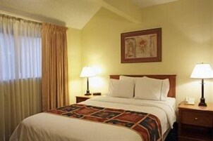 Premium bedding, desk, iron/ironing board, free cribs/infant beds
