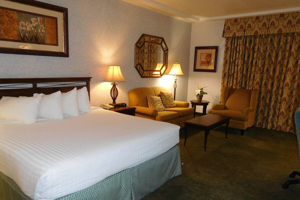 pillow-top beds, desk, blackout curtains, iron/ironing board