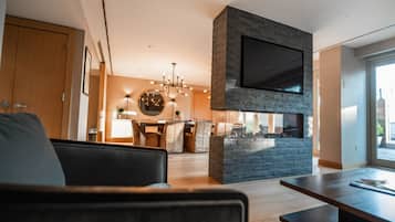 55-tums LED-tv med satellitkanaler, tv och en iPod-dockningsstation