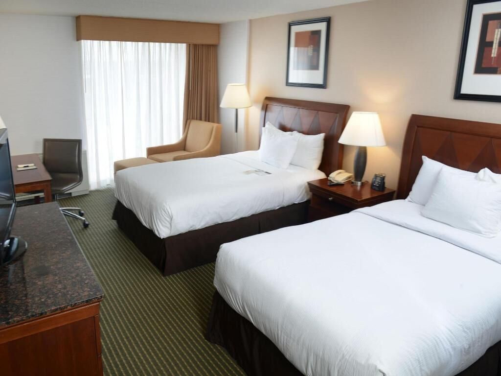 Premium bedding, down comforters, pillowtop beds, in-room safe
