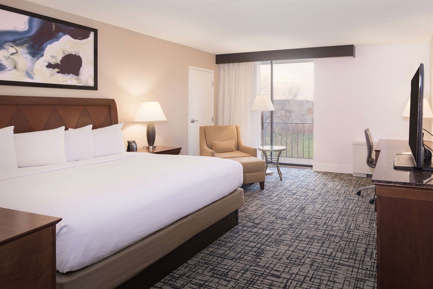 Premium bedding, down comforters, pillowtop beds, in-room safe