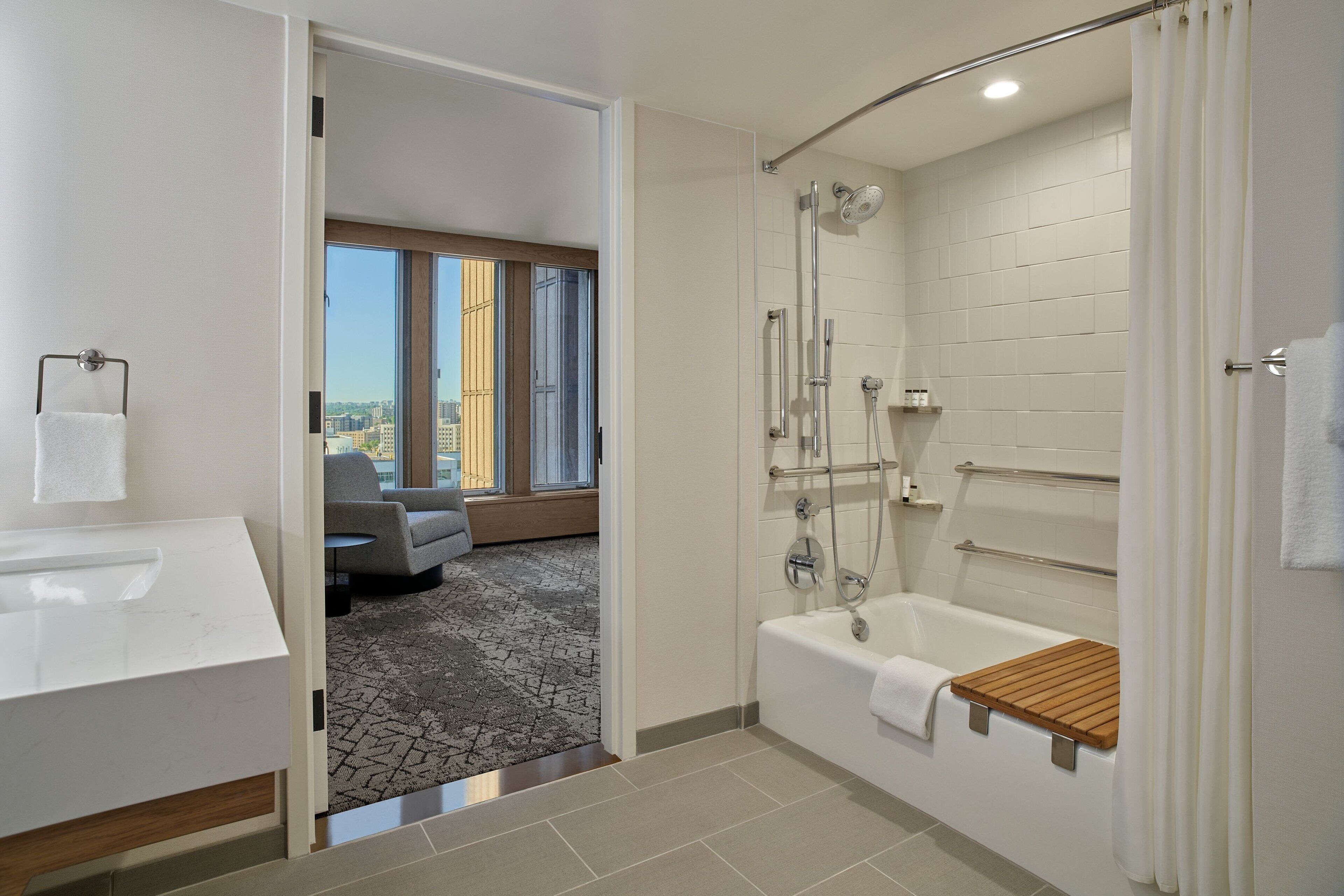 combined shower/bathtub, eco-friendly toiletries, hair dryer, towels