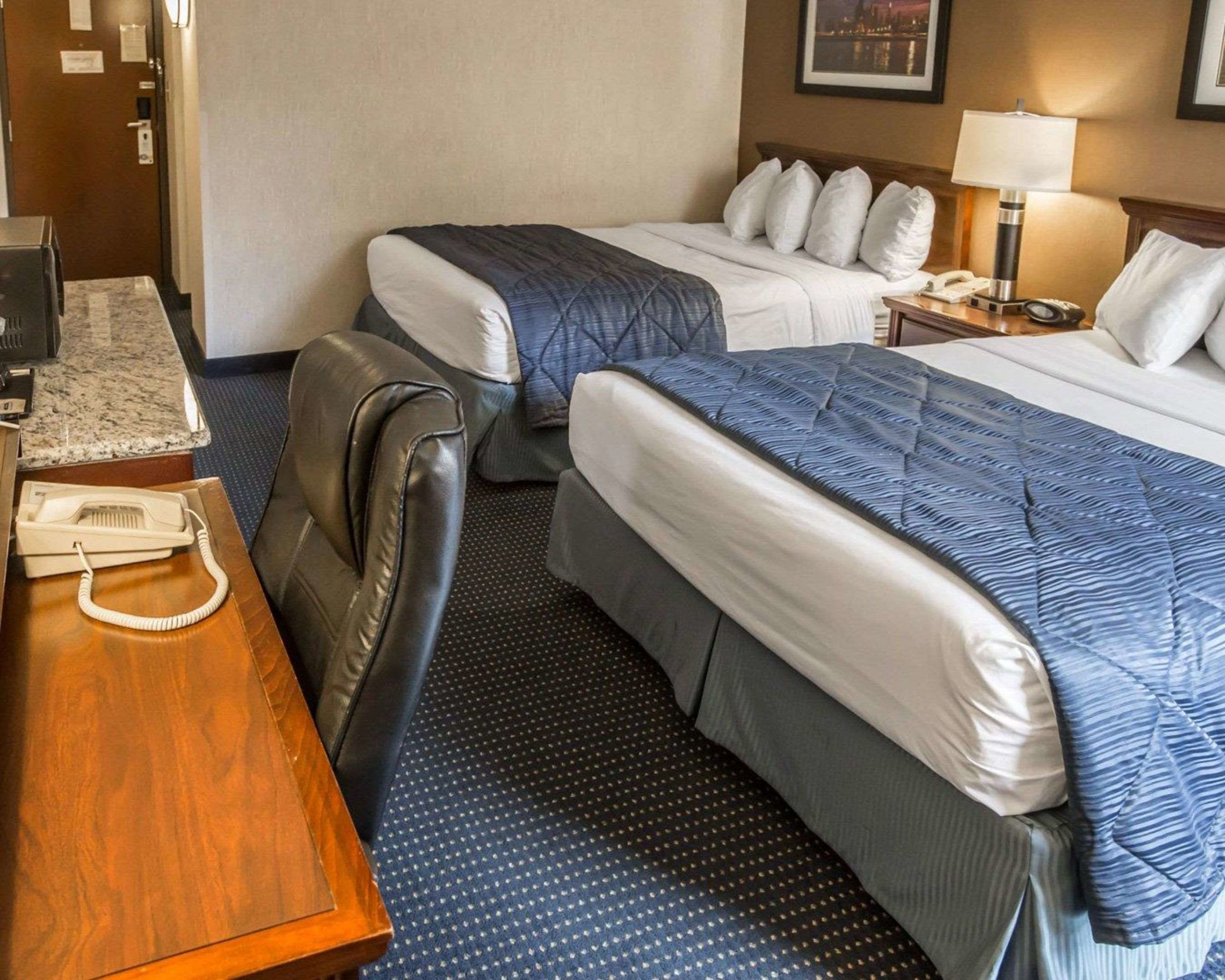 standard room, 2 queen beds, non smoking | desk, blackout curtains, iron/ironing board, free cots/infant beds