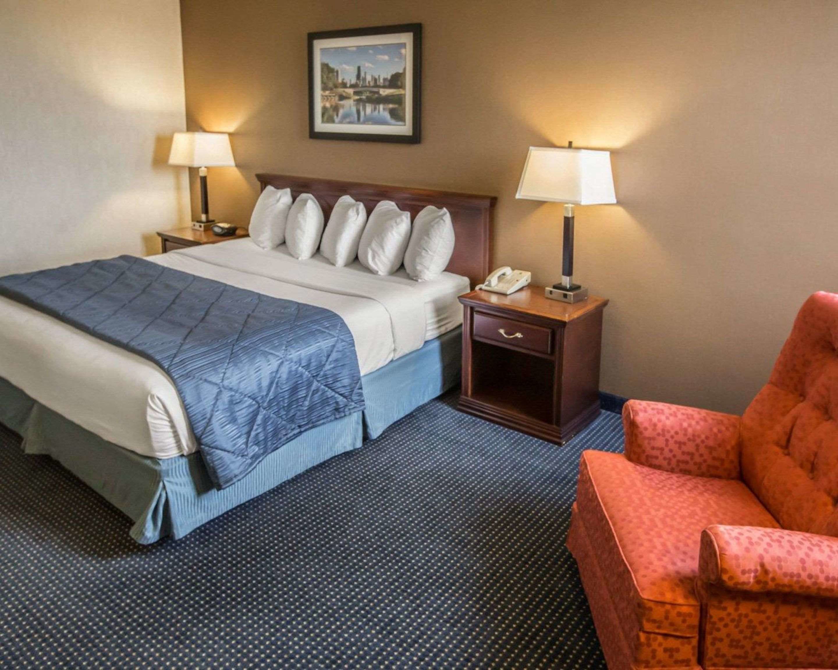 desk, blackout curtains, iron/ironing board, free cots/infant beds