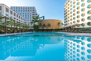 Outdoor pool, pool umbrellas, sun loungers
