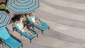 Outdoor pool, pool umbrellas, pool loungers