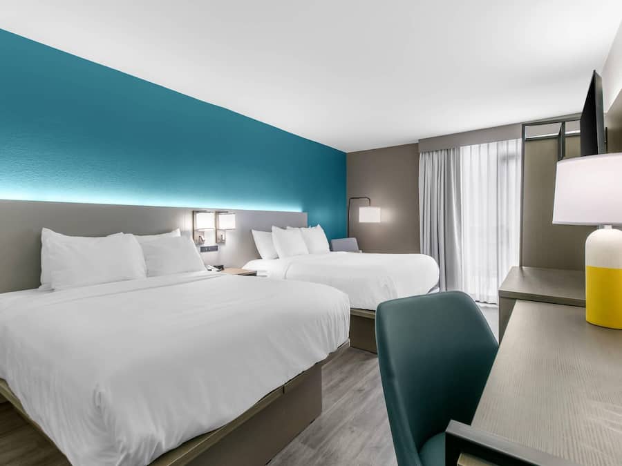 Standard Room, 2 Queen Beds, Non Smoking, Patio | In-room safe, desk, blackout drapes, iron/ironing board