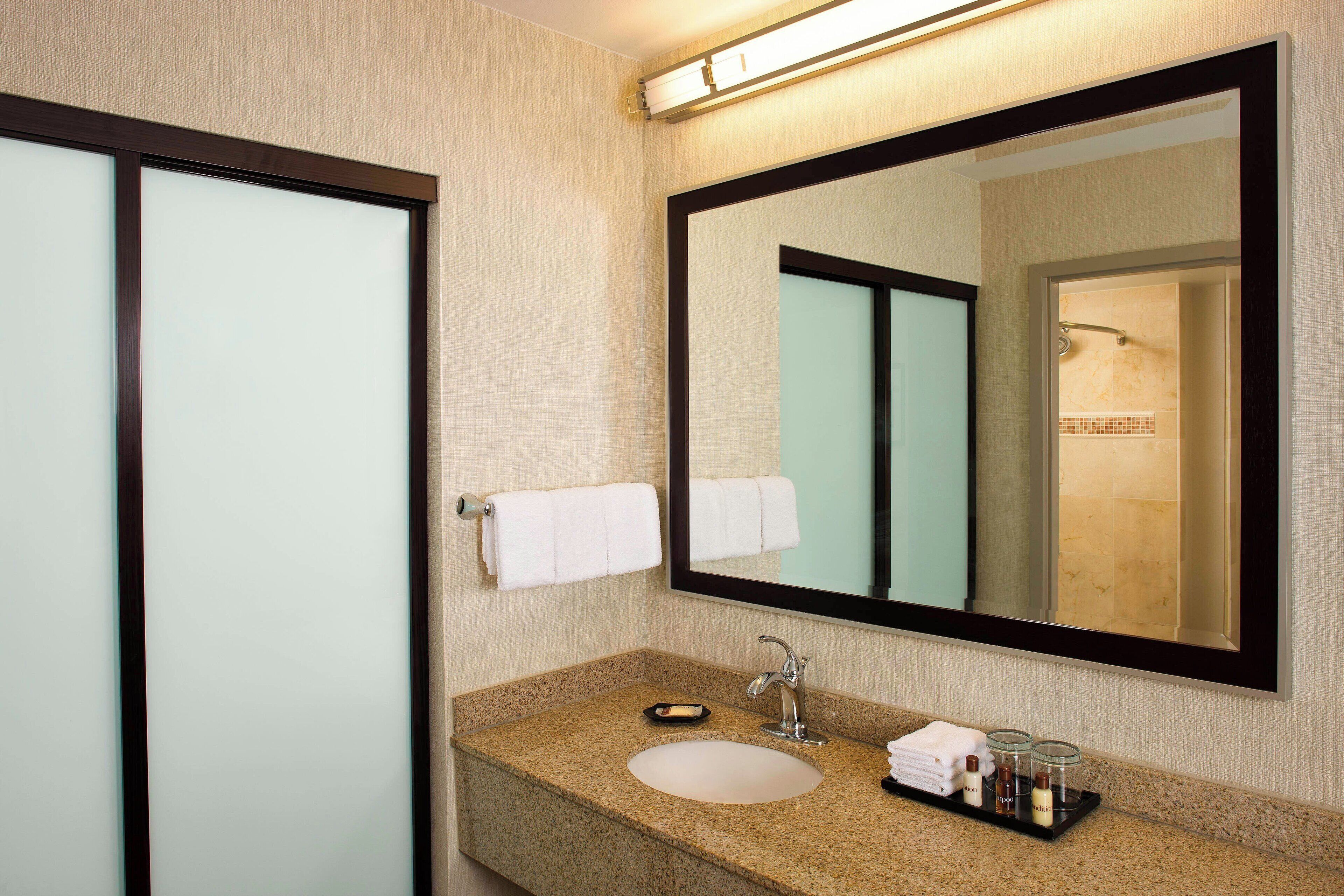 suite, 1 bedroom, non smoking | bathroom | combined shower/bathtub, designer toiletries, hair dryer, towels