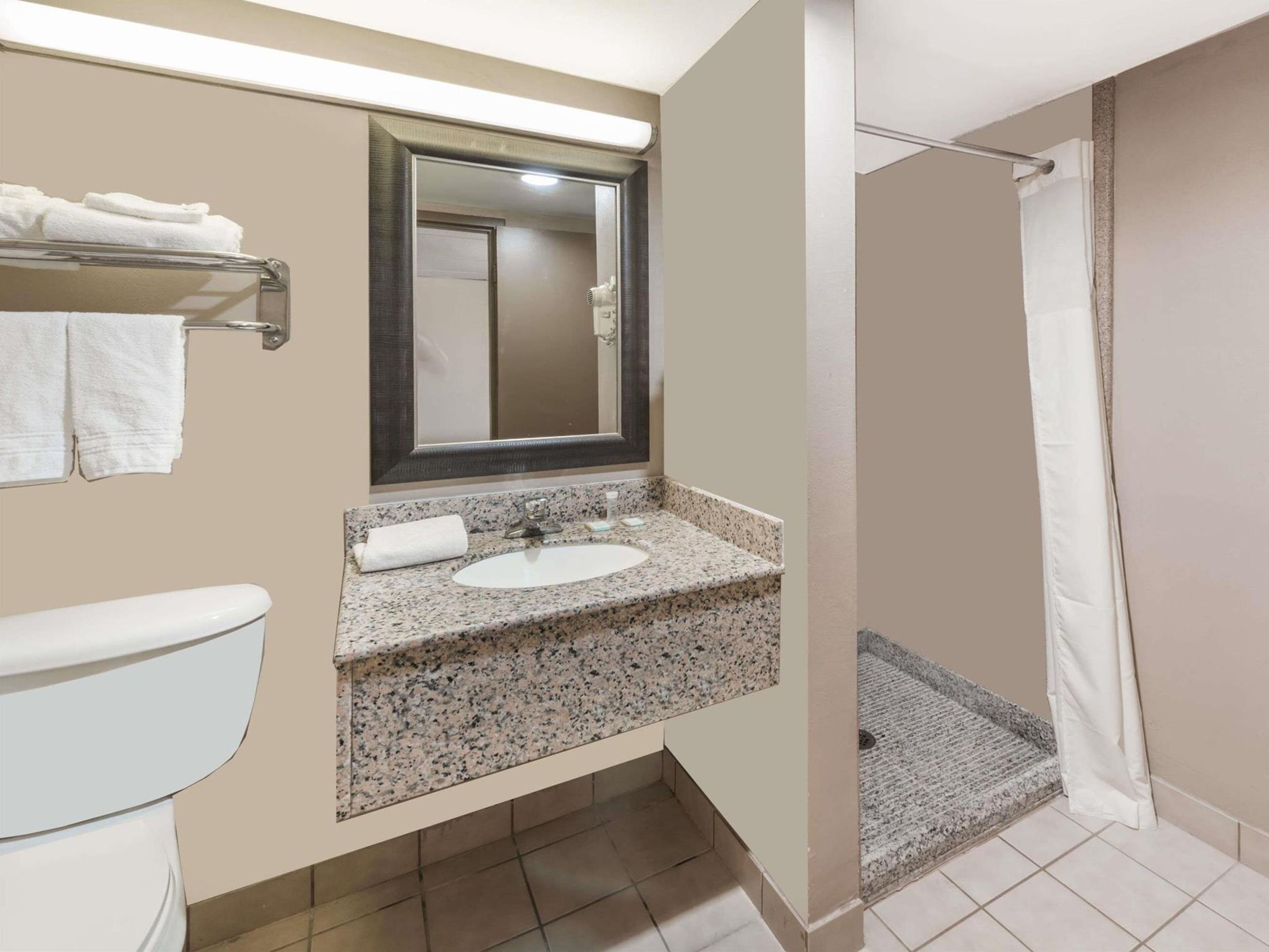 Eco-friendly toiletries, hair dryer, towels, soap