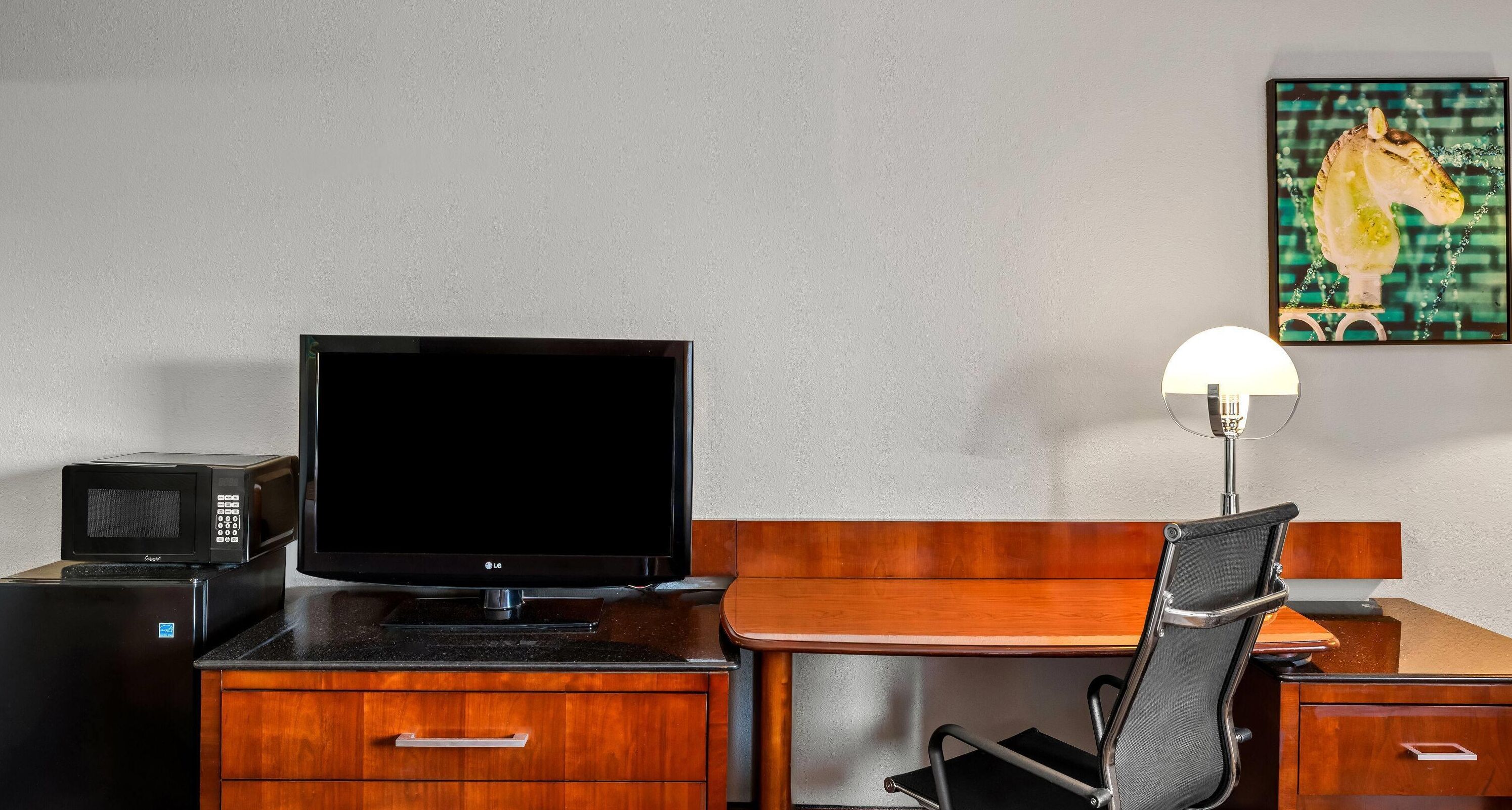 Room, 2 Queen Beds, Non Smoking | In-room safe, desk, laptop workspace, blackout curtains