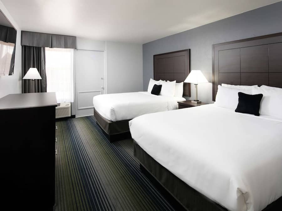 Down comforters, desk, blackout drapes, iron/ironing board