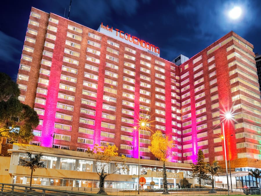A multi-story hotel with a prominent sign reading "hotel TEQUENDAMA."