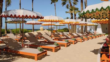 2 outdoor pools, pool umbrellas, pool loungers