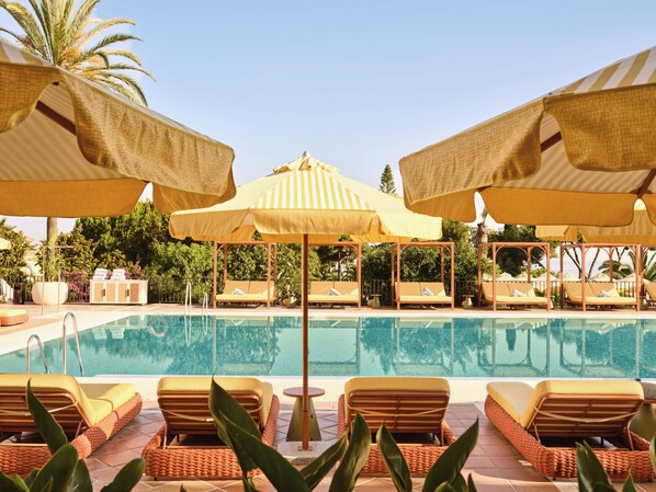 2 outdoor pools, pool umbrellas, sun loungers