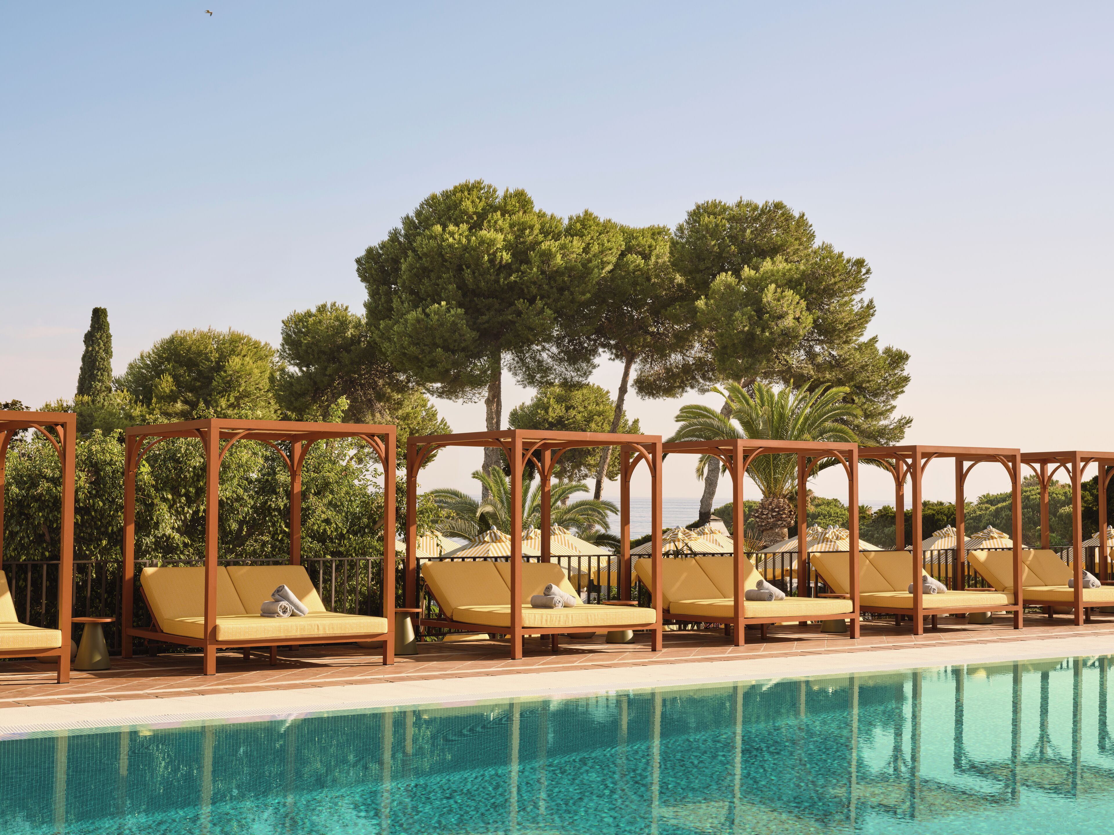 2 outdoor pools, pool umbrellas, pool loungers