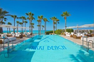 2 outdoor pools, pool umbrellas, pool loungers