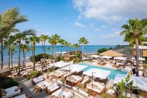 2 outdoor pools, pool umbrellas, pool loungers