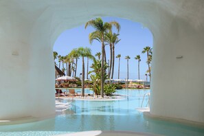 2 outdoor pools, pool umbrellas, pool loungers