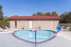 Seasonal outdoor pool, pool loungers