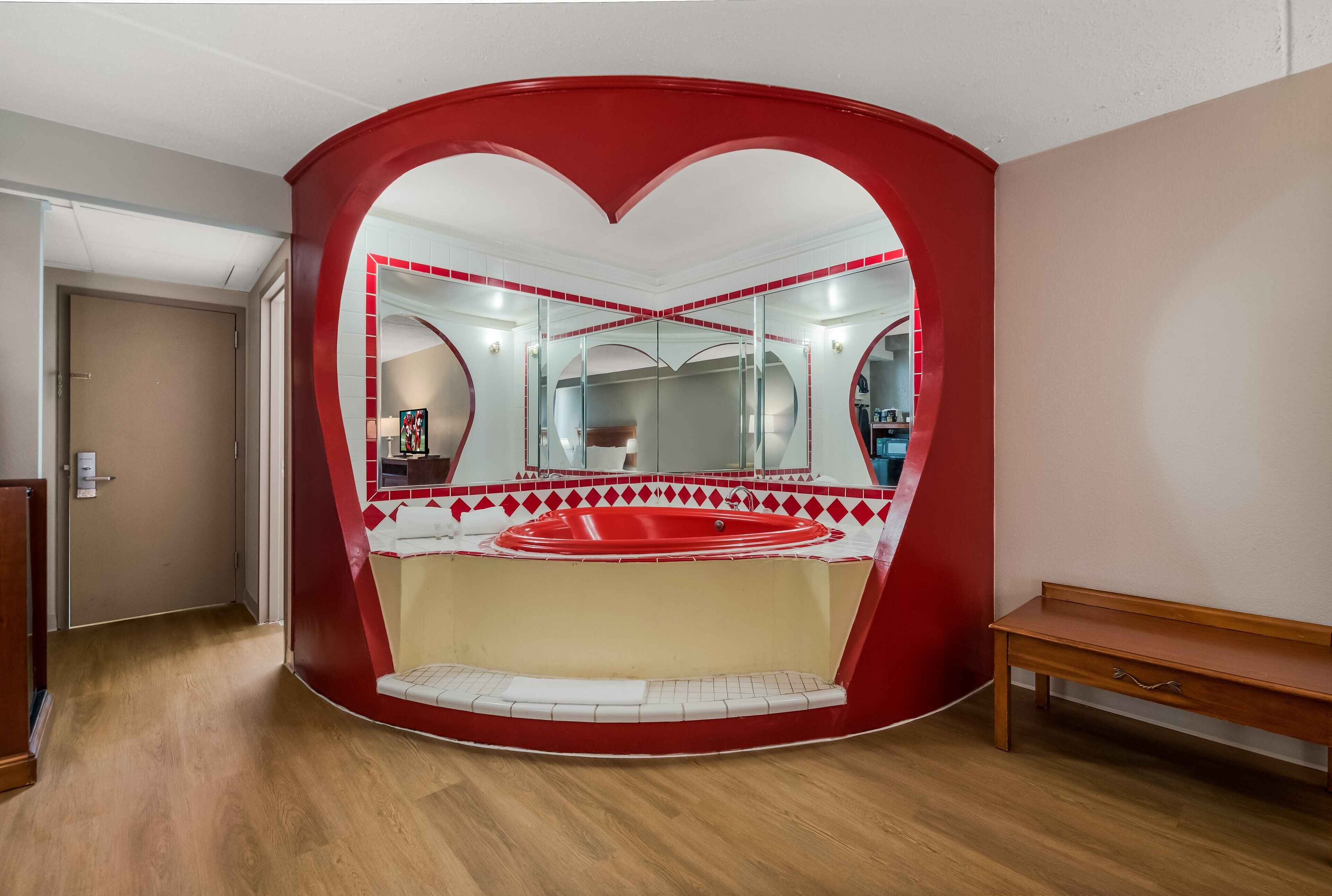 Suite, 1 King Bed, Non Smoking, Jetted Tub | Premium bedding, blackout drapes, iron/ironing board