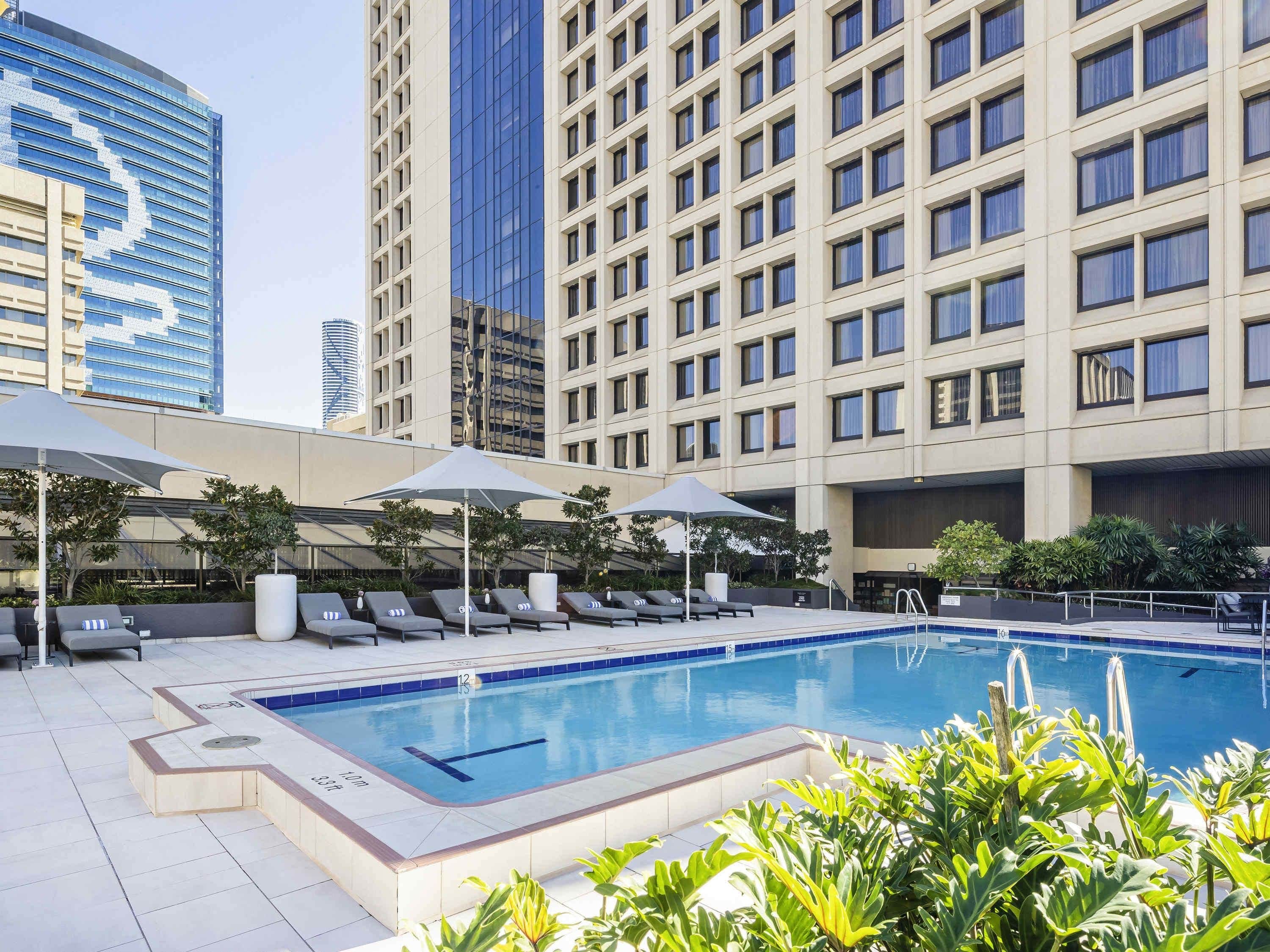 Outdoor pool, open 6:00 AM to 9:00 PM, pool umbrellas, sun loungers
