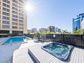 Outdoor pool, open 6:00 AM to 9:00 PM, pool umbrellas, pool loungers