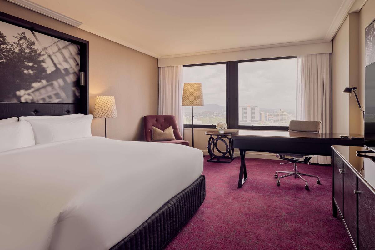 Premium bedding, down comforters, pillowtop beds, in-room safe