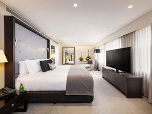 Premium bedding, down comforters, pillowtop beds, in-room safe