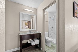 Standard Room, 2 Queen Beds, Non Smoking | Bathroom | Eco-friendly toiletries, towels, toilet paper