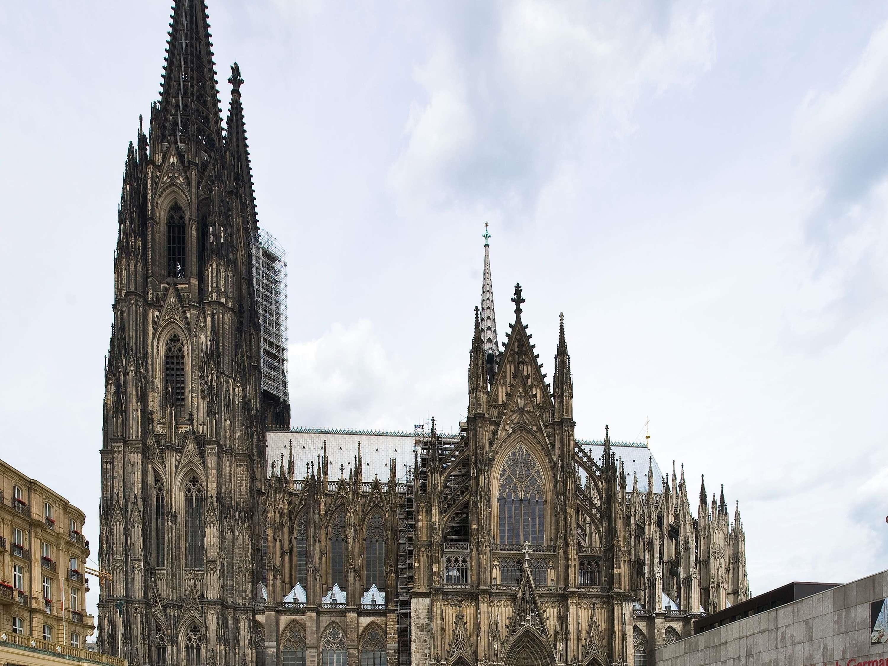 A large Gothic cathedral with intricate spires and detailed stonework.