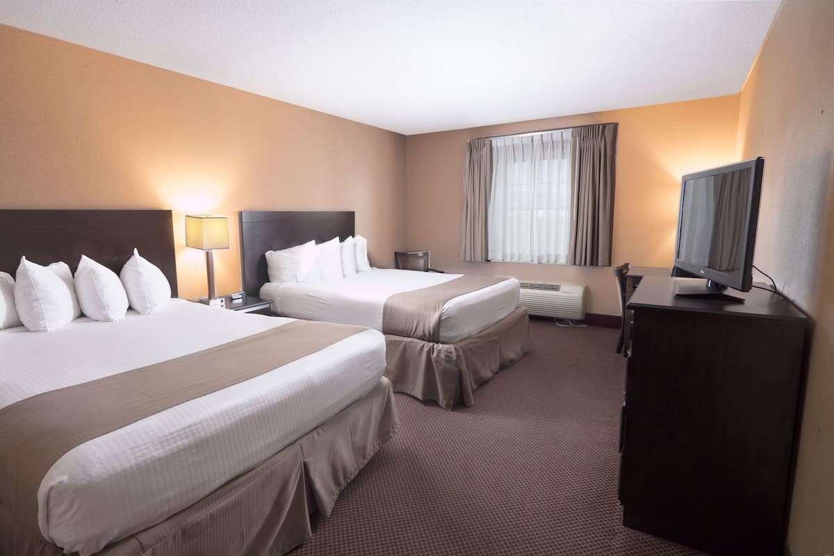 Room, 2 Queen Beds, Smoking | Desk, iron/ironing board, free cribs/infant beds, rollaway beds
