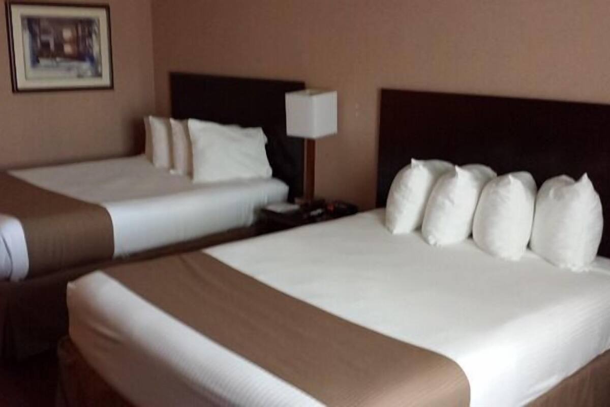 Room, 2 Queen Beds, Non Smoking | Desk, iron/ironing board, cribs (free), rollaway beds (surcharge)
