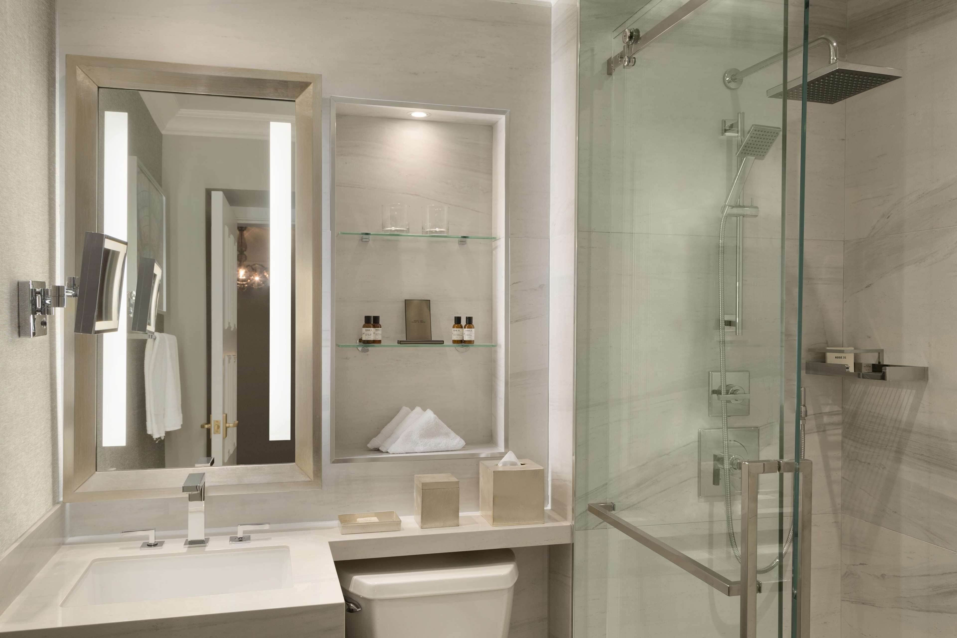 designer toiletries, hair dryer, bathrobes, slippers