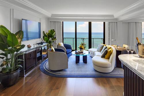 Suite, Oceanfront (Imperial) | Living room | 55-inch flat-screen TV with cable channels, TV, pay movies