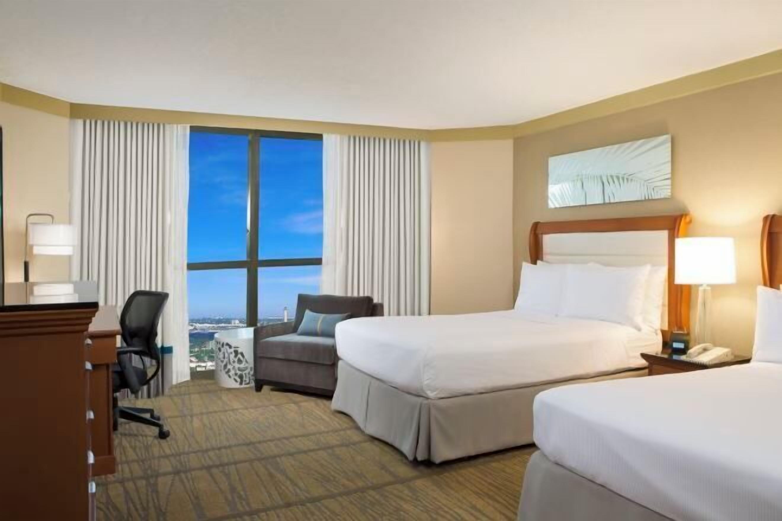 Premium bedding, down comforters, pillowtop beds, in-room safe